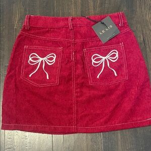 Le Lis Vibrant Red Mini Skirt with White Bow Accents